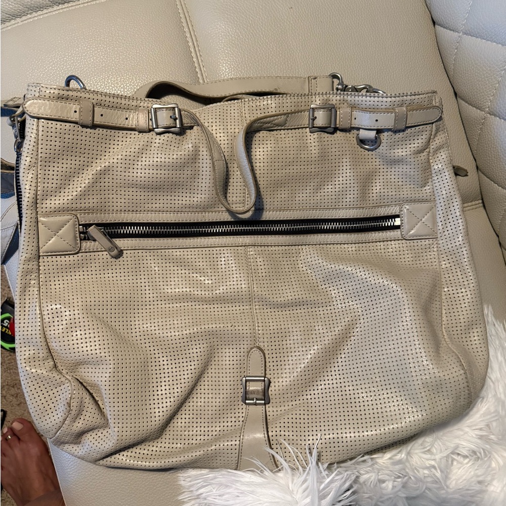 Ash handbag. Measures 19 in wide and 15 in tall. Inside pockets.